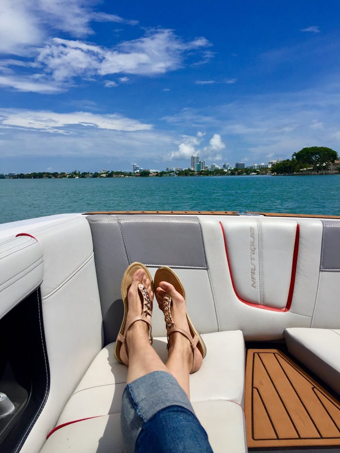 services-img Enjoy a sunny day relaxing on a luxury yacht with a city skyline view.